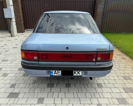 Синій Мазда 323, об'ємом двигуна 1.4 л та пробігом 217 тис. км за 3026 $, фото 2 на Automoto.ua