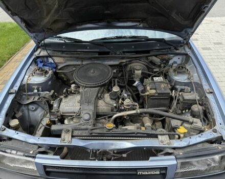 Синій Мазда 323, об'ємом двигуна 1.4 л та пробігом 217 тис. км за 3026 $, фото 5 на Automoto.ua