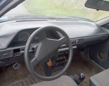 Синій Мазда 323, об'ємом двигуна 1.3 л та пробігом 300 тис. км за 550 $, фото 4 на Automoto.ua