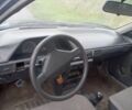 Синій Мазда 323, об'ємом двигуна 1.3 л та пробігом 300 тис. км за 550 $, фото 4 на Automoto.ua