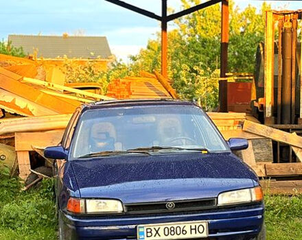 Синій Мазда 323, об'ємом двигуна 1.6 л та пробігом 220 тис. км за 1499 $, фото 1 на Automoto.ua