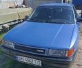 Синій Мазда 323, об'ємом двигуна 1.3 л та пробігом 322 тис. км за 1000 $, фото 3 на Automoto.ua