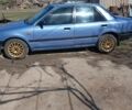 Синій Мазда 323, об'ємом двигуна 1.3 л та пробігом 322 тис. км за 1000 $, фото 5 на Automoto.ua