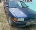 Синій Мазда 323, об'ємом двигуна 1 л та пробігом 427 тис. км за 720 $, фото 1 на Automoto.ua