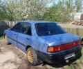 Синій Мазда 323, об'ємом двигуна 1.3 л та пробігом 322 тис. км за 1000 $, фото 1 на Automoto.ua