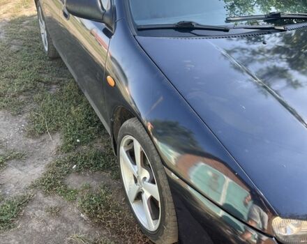 Синий Мазда 323, объемом двигателя 1.5 л и пробегом 425 тыс. км за 1400 $, фото 1 на Automoto.ua