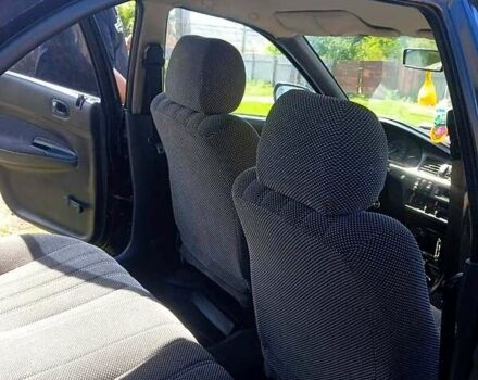 Синий Мазда 323, объемом двигателя 1.3 л и пробегом 429 тыс. км за 2100 $, фото 5 на Automoto.ua