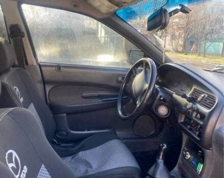 Синій Мазда 323, об'ємом двигуна 1.5 л та пробігом 478 тис. км за 1900 $, фото 1 на Automoto.ua