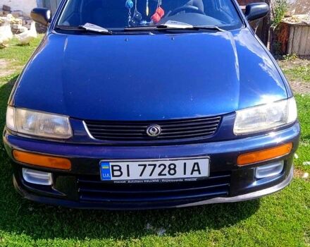 Синий Мазда 323, объемом двигателя 1.3 л и пробегом 429 тыс. км за 2100 $, фото 1 на Automoto.ua