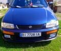 Синий Мазда 323, объемом двигателя 1.3 л и пробегом 429 тыс. км за 2100 $, фото 1 на Automoto.ua