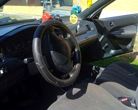 Синий Мазда 323, объемом двигателя 1.3 л и пробегом 429 тыс. км за 2100 $, фото 3 на Automoto.ua