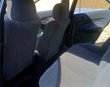 Синий Мазда 323, объемом двигателя 1.3 л и пробегом 429 тыс. км за 2100 $, фото 4 на Automoto.ua