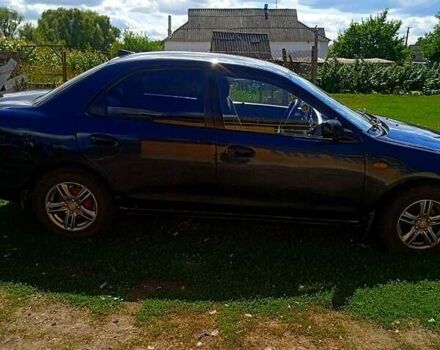 Синий Мазда 323, объемом двигателя 1.3 л и пробегом 429 тыс. км за 2100 $, фото 9 на Automoto.ua