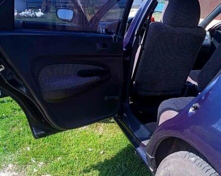 Синий Мазда 323, объемом двигателя 1.3 л и пробегом 429 тыс. км за 2100 $, фото 6 на Automoto.ua