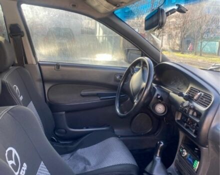 Синий Мазда 323, объемом двигателя 1.5 л и пробегом 3 тыс. км за 1900 $, фото 2 на Automoto.ua