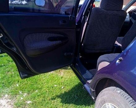 Синий Мазда 323, объемом двигателя 1.3 л и пробегом 429 тыс. км за 2100 $, фото 7 на Automoto.ua