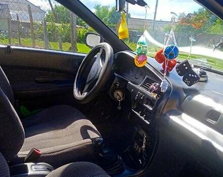 Синий Мазда 323, объемом двигателя 1.3 л и пробегом 429 тыс. км за 2100 $, фото 3 на Automoto.ua