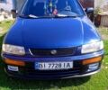 Синий Мазда 323, объемом двигателя 1.3 л и пробегом 429 тыс. км за 2100 $, фото 1 на Automoto.ua