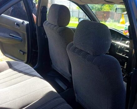 Синий Мазда 323, объемом двигателя 1.3 л и пробегом 429 тыс. км за 2100 $, фото 6 на Automoto.ua