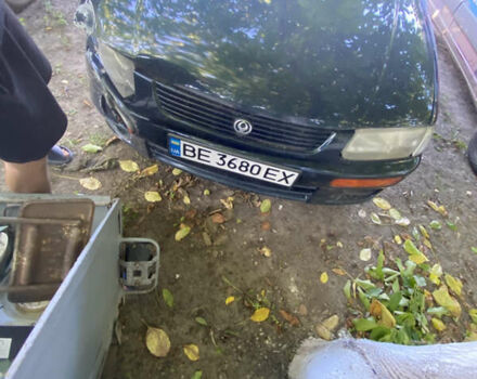 Синій Мазда 323, об'ємом двигуна 1.3 л та пробігом 395 тис. км за 1750 $, фото 10 на Automoto.ua