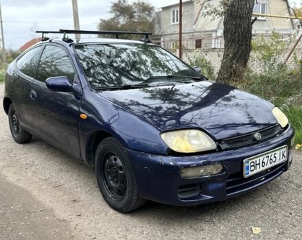 Синій Мазда 323, об'ємом двигуна 1.5 л та пробігом 200 тис. км за 1000 $, фото 1 на Automoto.ua