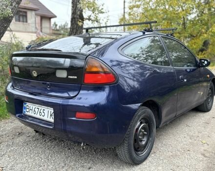Синій Мазда 323, об'ємом двигуна 1.5 л та пробігом 200 тис. км за 1000 $, фото 2 на Automoto.ua