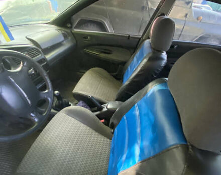 Синій Мазда 323, об'ємом двигуна 1.3 л та пробігом 395 тис. км за 1750 $, фото 8 на Automoto.ua