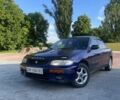 Синий Мазда 323, объемом двигателя 1.5 л и пробегом 380 тыс. км за 1400 $, фото 1 на Automoto.ua