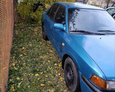 Синий Мазда 323, объемом двигателя 1.69 л и пробегом 250 тыс. км за 750 $, фото 8 на Automoto.ua