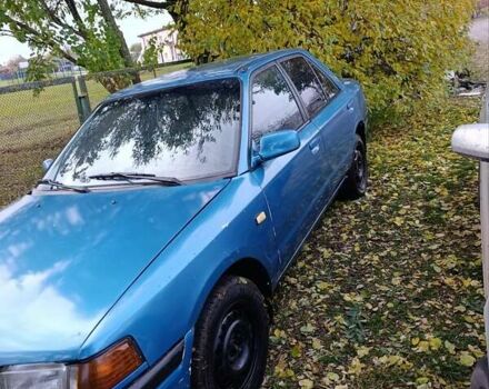 Синий Мазда 323, объемом двигателя 1.69 л и пробегом 250 тыс. км за 750 $, фото 7 на Automoto.ua