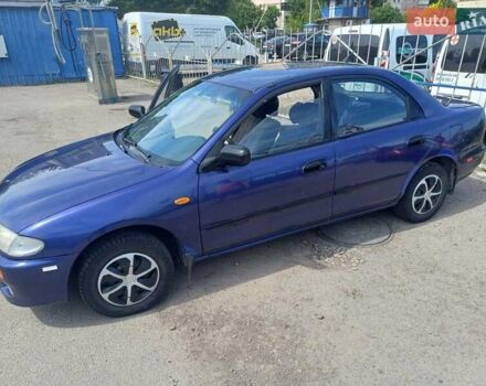 Синий Мазда 323, объемом двигателя 1.5 л и пробегом 295 тыс. км за 2300 $, фото 19 на Automoto.ua
