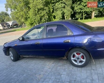 Синий Мазда 323, объемом двигателя 1.5 л и пробегом 380 тыс. км за 1400 $, фото 4 на Automoto.ua