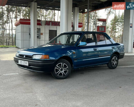 Синий Мазда 323, объемом двигателя 1.6 л и пробегом 250 тыс. км за 1900 $, фото 1 на Automoto.ua