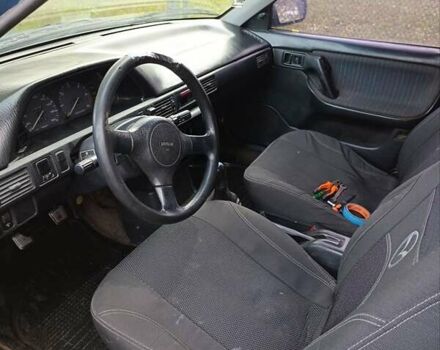 Синий Мазда 323, объемом двигателя 1.69 л и пробегом 250 тыс. км за 750 $, фото 2 на Automoto.ua