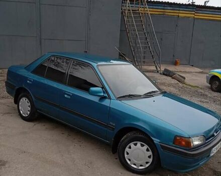 Синий Мазда 323, объемом двигателя 1.6 л и пробегом 159 тыс. км за 3000 $, фото 2 на Automoto.ua