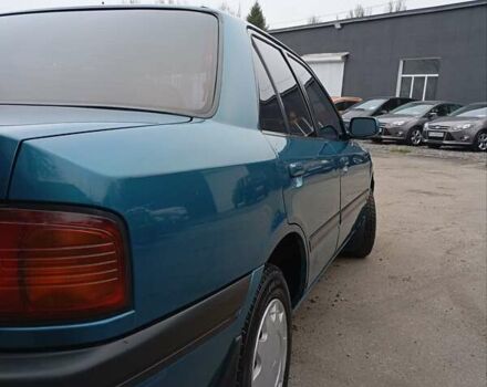 Синий Мазда 323, объемом двигателя 1.6 л и пробегом 159 тыс. км за 3000 $, фото 4 на Automoto.ua