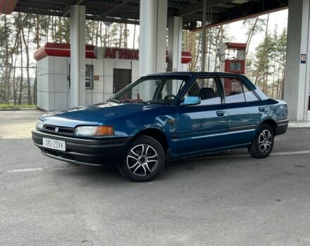 Синий Мазда 323, объемом двигателя 1.6 л и пробегом 250 тыс. км за 1900 $, фото 1 на Automoto.ua