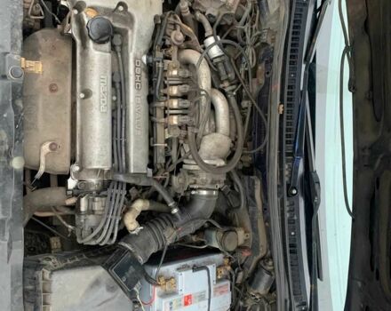 Синий Мазда 323, объемом двигателя 1.5 л и пробегом 419 тыс. км за 2500 $, фото 1 на Automoto.ua