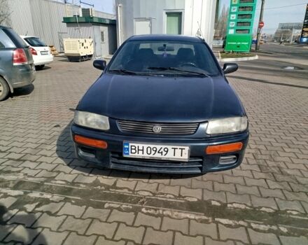 Синий Мазда 323, объемом двигателя 0 л и пробегом 287 тыс. км за 1700 $, фото 1 на Automoto.ua