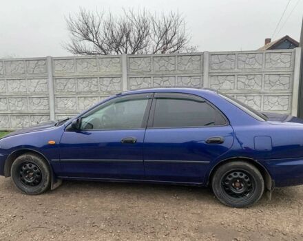 Синий Мазда 323, объемом двигателя 1.5 л и пробегом 419 тыс. км за 2500 $, фото 6 на Automoto.ua