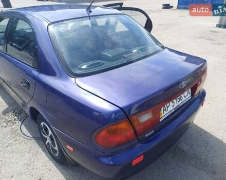 Синий Мазда 323, объемом двигателя 1.5 л и пробегом 295 тыс. км за 2300 $, фото 17 на Automoto.ua