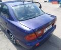 Синий Мазда 323, объемом двигателя 1.5 л и пробегом 295 тыс. км за 2300 $, фото 17 на Automoto.ua