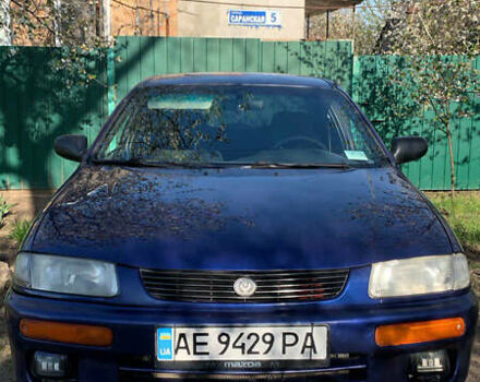 Синій Мазда 323, об'ємом двигуна 1.5 л та пробігом 419 тис. км за 1700 $, фото 1 на Automoto.ua