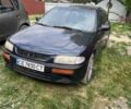 Синій Мазда 323, об'ємом двигуна 1.3 л та пробігом 300 тис. км за 2400 $, фото 1 на Automoto.ua