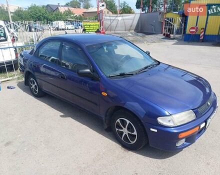 Синий Мазда 323, объемом двигателя 1.5 л и пробегом 295 тыс. км за 2300 $, фото 10 на Automoto.ua