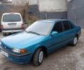 Синий Мазда 323, объемом двигателя 1.6 л и пробегом 160 тыс. км за 3000 $, фото 1 на Automoto.ua