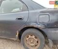 Синий Мазда 323, объемом двигателя 1.49 л и пробегом 595 тыс. км за 1250 $, фото 1 на Automoto.ua