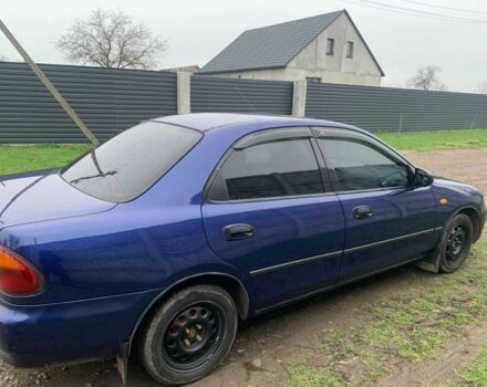 Синий Мазда 323, объемом двигателя 1.5 л и пробегом 419 тыс. км за 2500 $, фото 7 на Automoto.ua