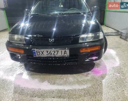 Синий Мазда 323, объемом двигателя 1.5 л и пробегом 430 тыс. км за 1300 $, фото 3 на Automoto.ua