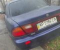 Синий Мазда 323, объемом двигателя 1.5 л и пробегом 295 тыс. км за 2300 $, фото 1 на Automoto.ua